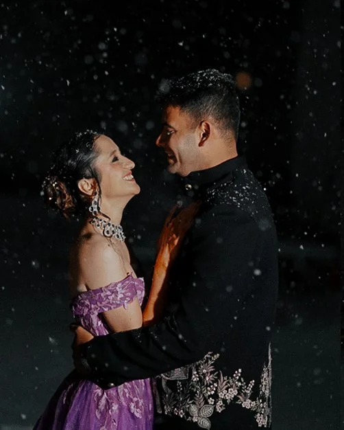 Engagement couple posing outdoors.
