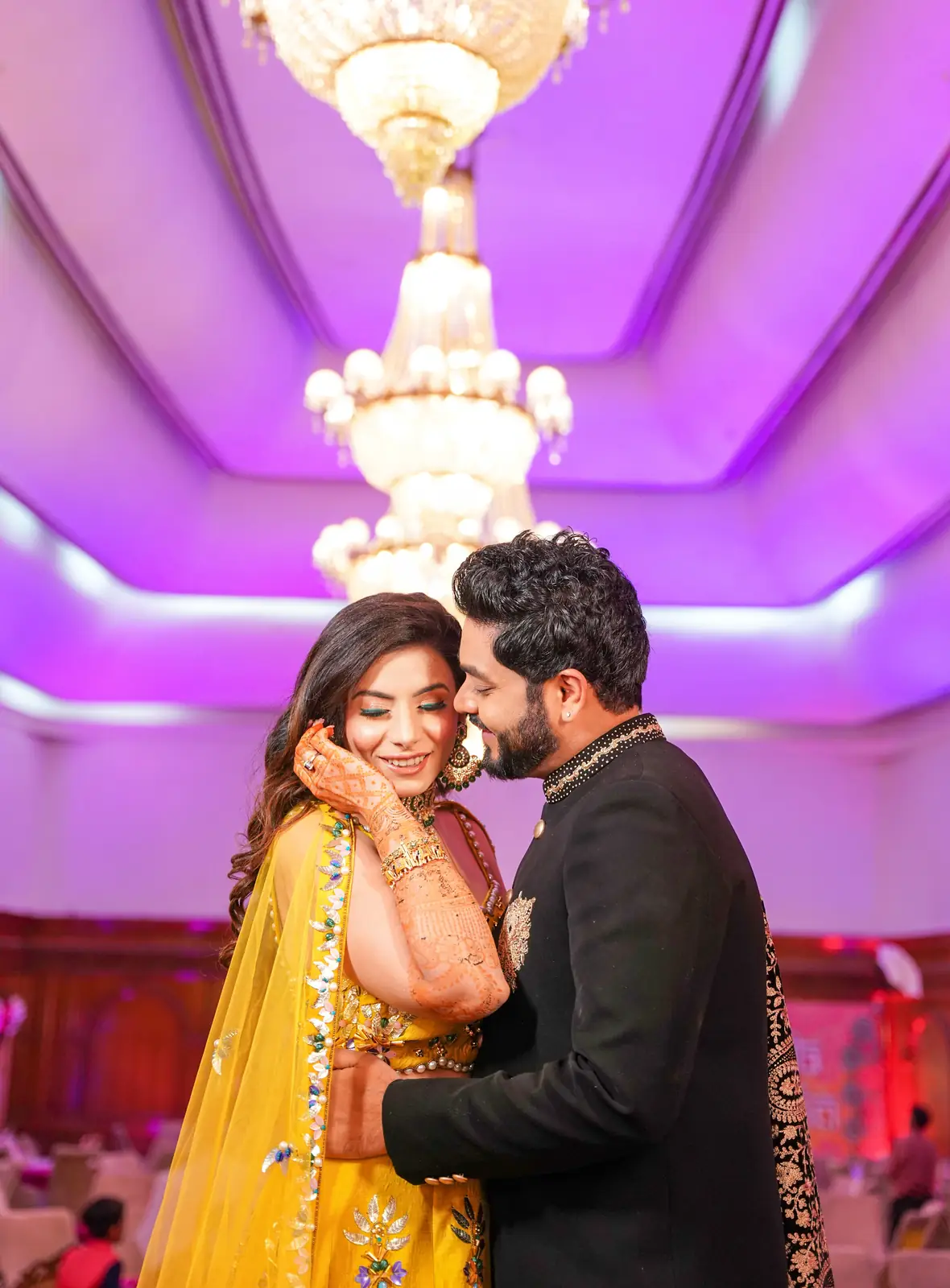 Outdoor engagement photoshoot capturing couple in a warm candid moment