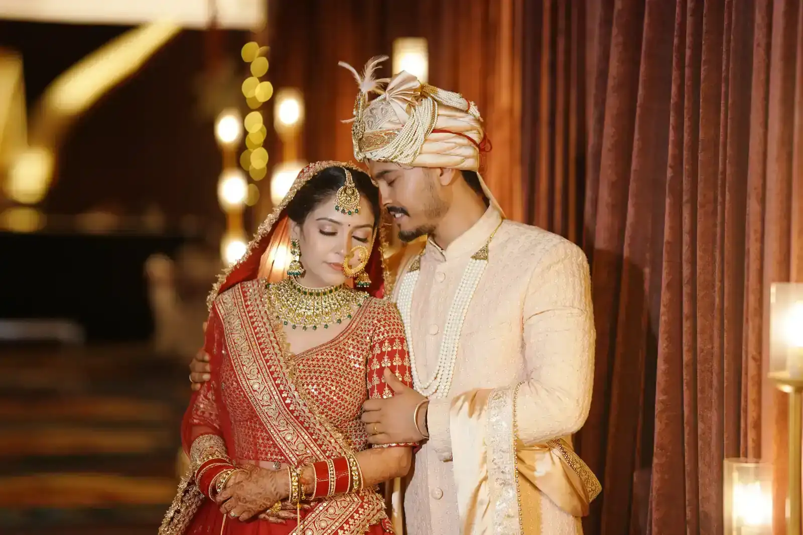 A bride and groom sharing a tender moment during their wedding