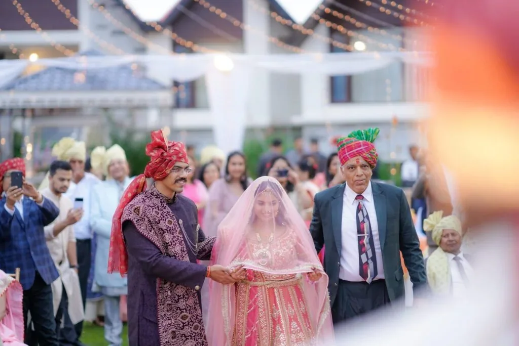 Cinematic wedding photoshoot capturing the bride and groom in a traditional setting