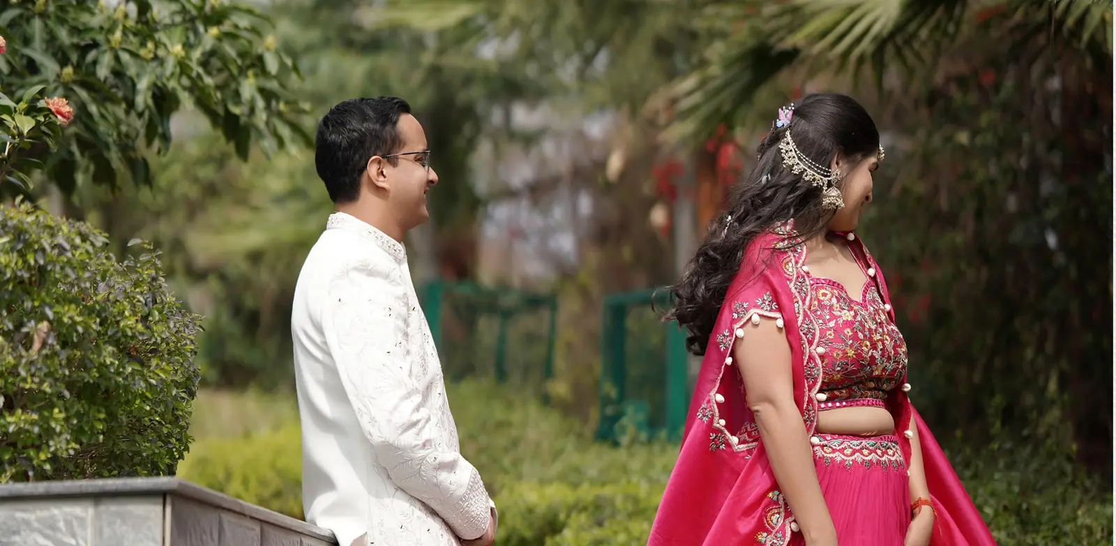 Bride and groom in a traditional wedding ceremony portrait.
