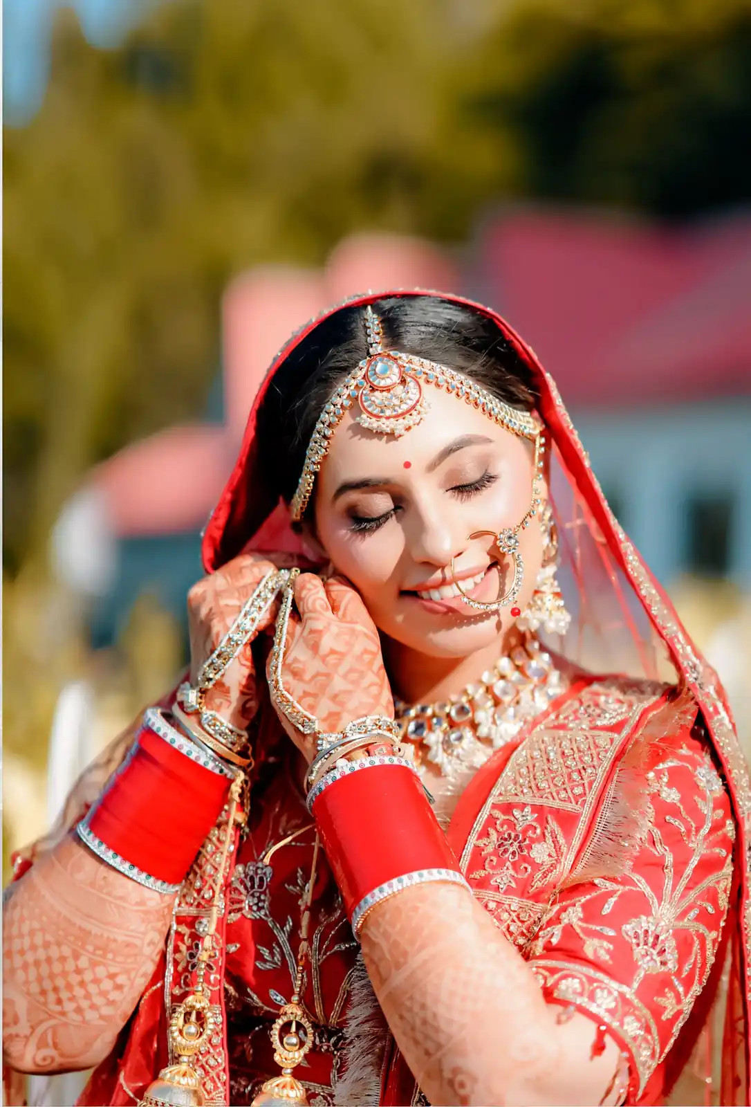 Couple smiling and posing during their wedding ceremony