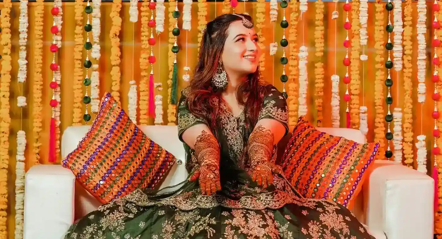 Indian wedding photoshoot capturing couple in traditional attire